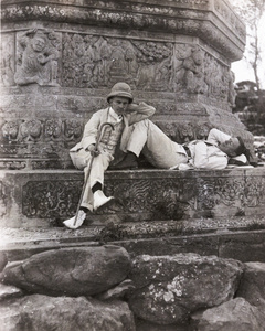 Oliver H. Hulme and another man by the base of Jade Fountain Marble Pagoda, Peking