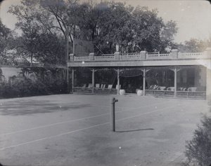 Tennis court and spectators' sheltered seating