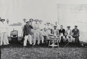 A group of men, with guns