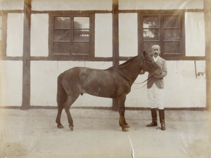 J. C. Oswald with 'Roulette', a winning racehorse
