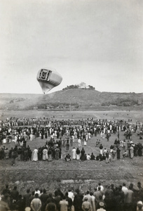 Sending up a balloon to advertise 'Hatamen' cigarettes, c.1925