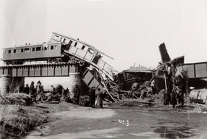 Train wrecked due to an explosion on a bridge, near Luanzhou