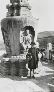 Margaret Lampson by a marble stupa, Temple of the Azure Clouds, Western Hills, Beijing
