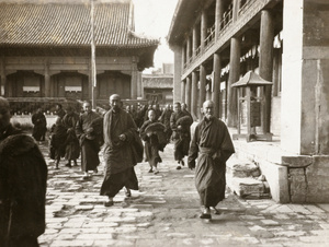 Lama priests and a prayer wheel, Yonghe Temple (雍和宮) ‘The Lama Temple’, Beijing