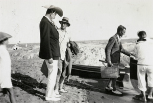 Sir Miles Lampson on a beach