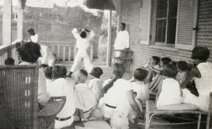 Children watching an acrobatic performance