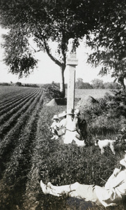 Resting by grave mounds