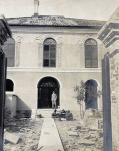 Mealtime during garden renovations, at 'Errol', the home of George and Esme Hutton Potts, Shanghai