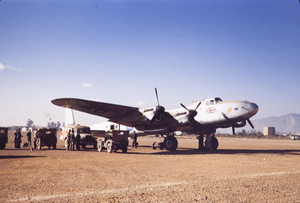 Fiddament's Lancastrian at Kunming, with jeeps and ambulance, 1945