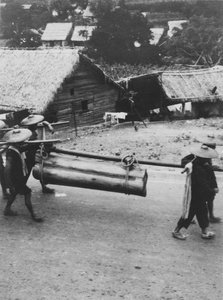 Bearers carrying coffin