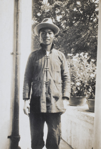 A man by some potted flowers, Hong Kong