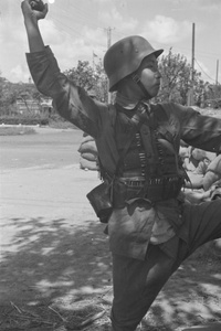 Nationalist soldier, with hand grenade