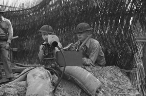 China Marines aiming a Browning heavy machine gun