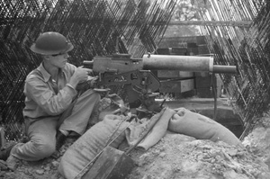 China Marine aiming a Browning heavy machine gun