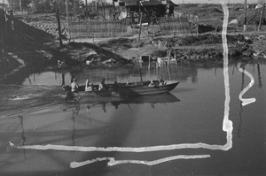 Japanese soldiers in a motor launch, Shanghai