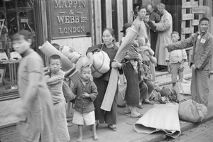 Refugees outside Mappin & Webb's shop, Shanghai