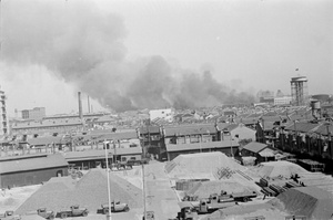 Overlooking stockyard towards smoke