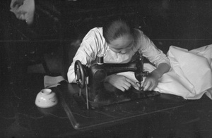 Woman sewing, Shanghai