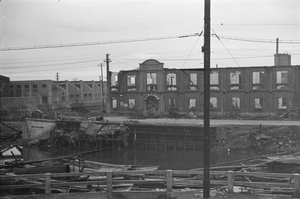 Bomb damaged factories and creek wharf, Shanghai