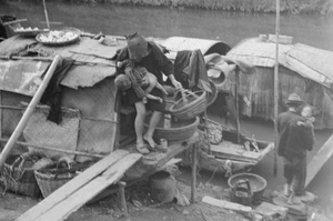 Shack and sampan, Shanghai