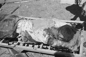 Casualty of bombing, Nanking Road, Shanghai, 23 August 1937