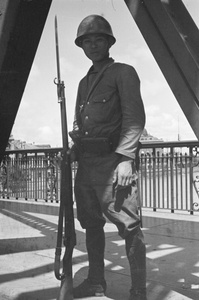 Japanese soldier on Garden Bridge, Shanghai