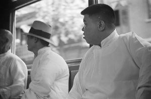 Passengers in a tram, Shanghai