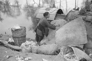 Rag picker and sampan, Shanghai