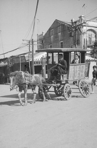 Pony and wagon with wonky wheel