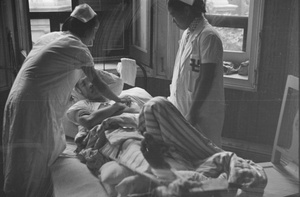 Nurses attending to patient, Shanghai