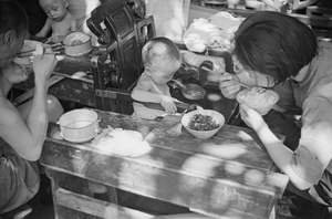 Refugee families eating, Shanghai