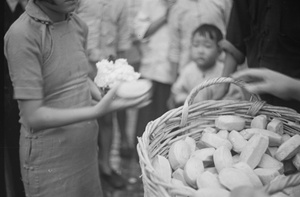 Women and children receiving food, Shanghai