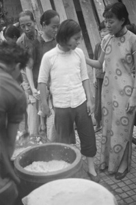 Women waiting for food dole, Shanghai