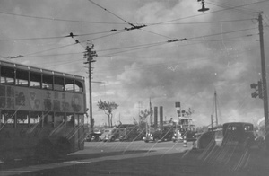 Cars and a trolleybus on the Bund, Shanghai