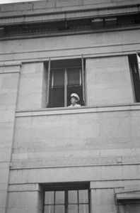 Officer looking out of a window, Shanghai