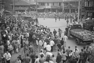 Crowd and barricades at a street junction, French Concession, Shanghai