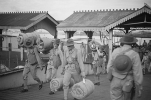 American Marines with bedrolls, arriving in Shanghai