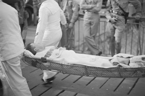 American Marines with man on stretcher, Shanghai