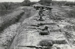 Soldiers training in a trench