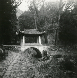 Decorative bridge over a stream