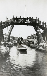 Wooden bridge and water traffic