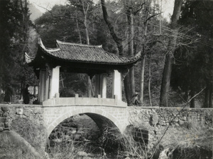 Decorative bridge over a stream