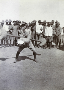 Demonstrating Chinese dumb-bells, 1st Chinese Regiment