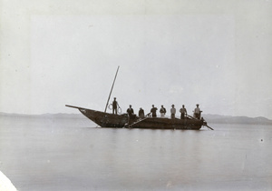 Deep sea diver beside a boat