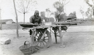 Hawking persimmons and roast peanuts, Peking