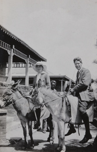 Connie and Freer Kelsey, with donkeys, Beidaihe