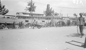 Paddle-steamer 'Pekin' discharging, Shanghai