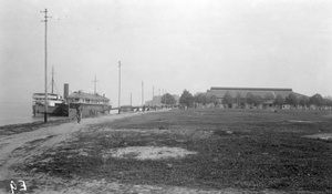 A steamship berthed by China Navigation Company hulk in Wuhu