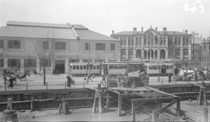 Trams, a warehouse, a pier and the Missions Étrangères, French Bund, Shanghai