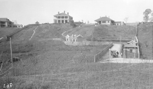 Houses, gatehouse and car, Nanking